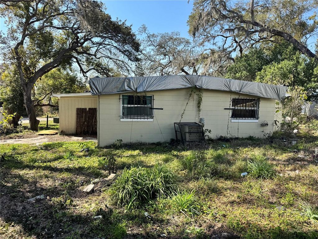 Photo of 7921 Lakeshore Drive, Tampa, FL 33604 (MLS # L4960530)