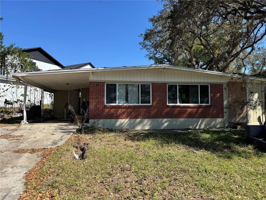 Photo of 7921 Lakeshore Drive, Tampa, FL 33604 (MLS # L4960530)