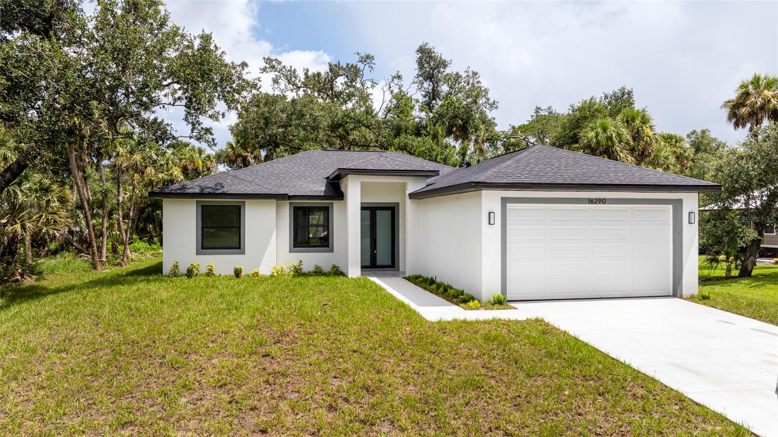 One or more photo(s) has been virtually staged. Welcome to your dream home! This beautifully crafted new construction offers 3 spacious bedrooms, a versatile den, and 2 modern bathrooms across 1,653 square feet of open-concept living. Step inside and be greeted by soaring 9'4" ceilings and oversized 8-ft doors that create an airy, elevated feel throughout.
The heart of this home is a chef-inspired kitchen, designed for both function and style. Featuring a large center island, quartz countertops, walk-in pantry, and top-tier stainless steel appliances, it’s the perfect place to gather with friends and family or whip up your favorite meals.
Retreat to the private primary suite, complete with dual walk-in closets and a luxurious ensuite bathroom that feels like your own personal spa. A thoughtful split floor plan ensures everyone has their own space, while a large laundry room adds everyday ease.
Nestled in a prime location near Port Charlotte’s top-rated schools, shopping, dining, and world-class beaches, this home offers convenient access to everything—boating, golf, and endless outdoor adventures await just minutes away.
Don’t miss your chance to own a stylish, move-in ready home in one of Southwest Florida’s most desirable neighborhoods. Schedule your private tour today and fall in love!