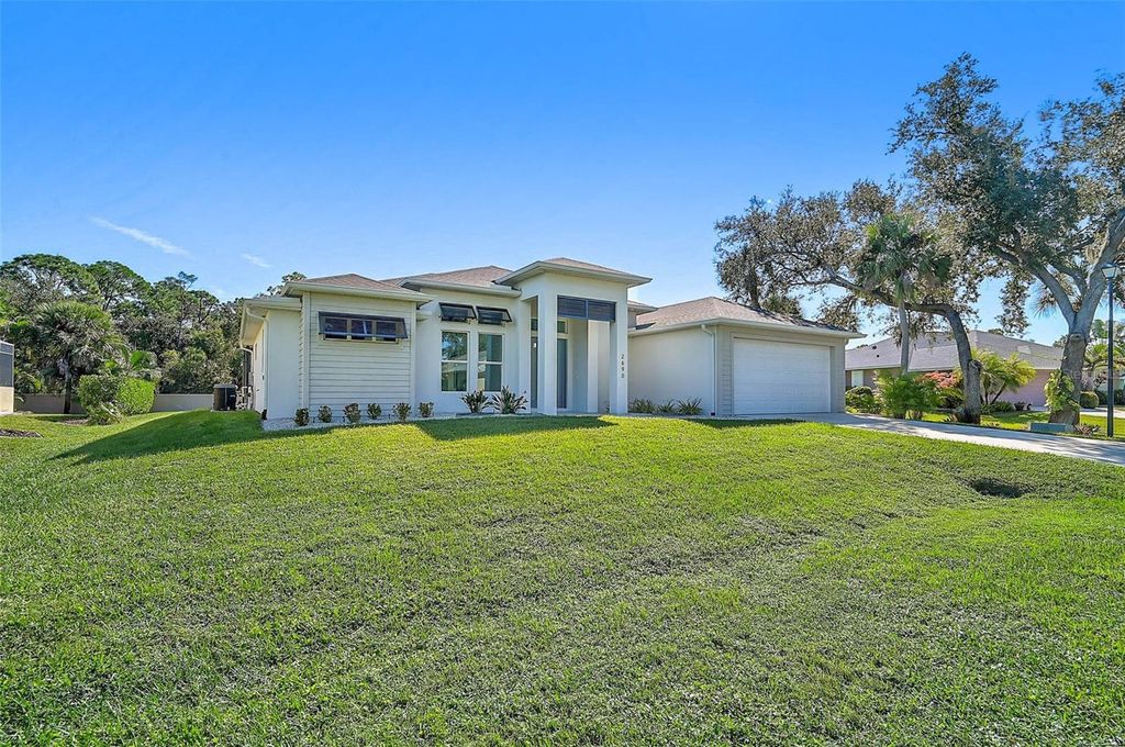 Photo of 2690 Pebble Creek Place, Port Charlotte, FL 33948 (MLS # N6141315)