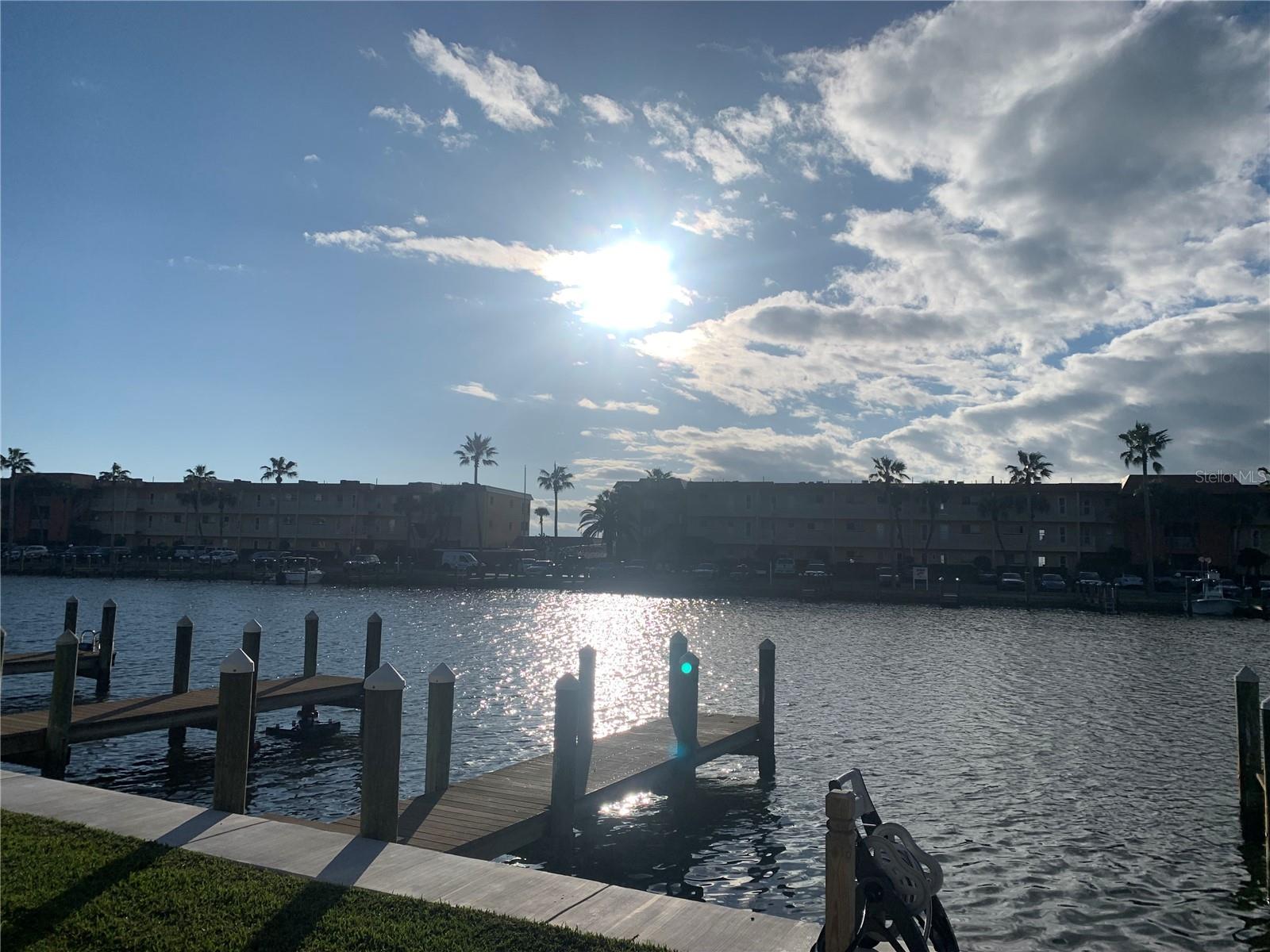 Bring your BOAT! this lovely and well-appointed condo sits directly on Blind Pass with a view of the Gulf of Mexico and has private boat dock for guests and owners. Completely updated with a beautiful large kitchen and stylish furnishings throughout. Primary bedroom has king bed and access to covered lanai/patio. Guest room features two double beds, Bathrooms are updated and brand-new washer and dryer in unit, Located on the quieter side of world famous 8-mile island of Siesta Key. Only 17 units in this community located very close to Turtle Beach. Free trolley comes by regularly for hop on hop off service to anywhere along the Key including both north and south Siesta Key Villages, for shopping, dining or just walking about. Sarasota is well known as "the jewel of the arts and theatre" and is second to none on the west coast of Florida. This beautiful property is a great escape to a tropical paradise and from the northern cold temperature. Owner will allow an approved dog 30 pounds or less.Available for occupancy starting December or January for one to four months.k