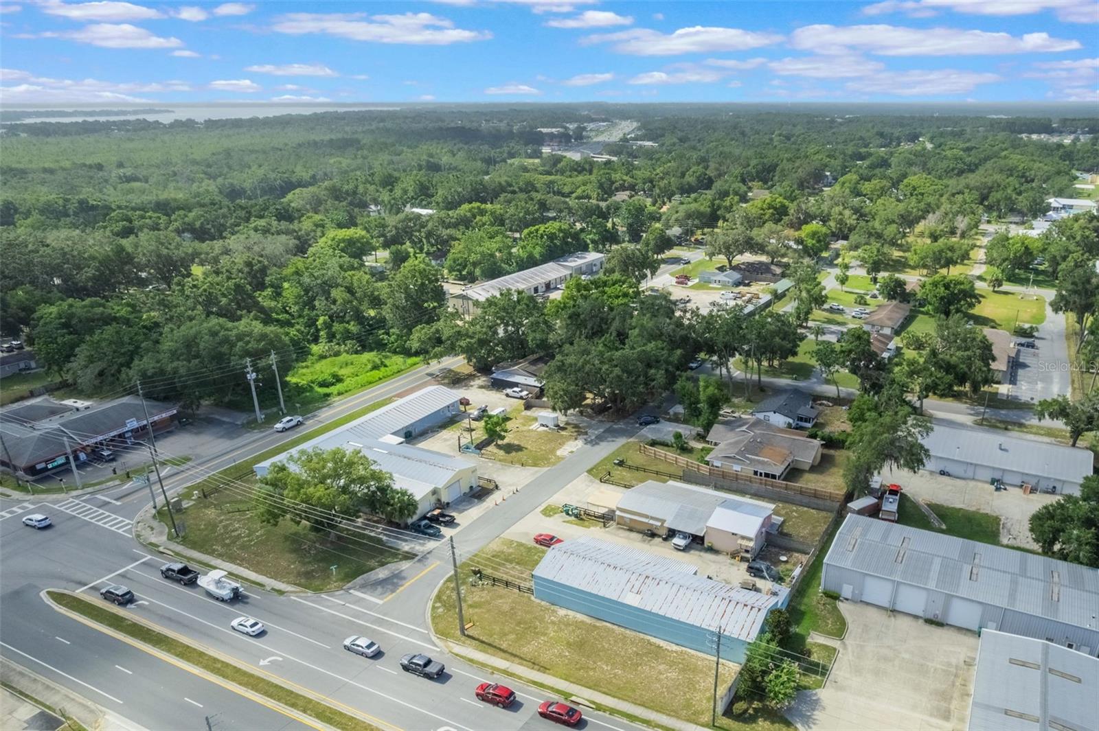 This is a rare and valuable opportunity to acquire a high-traffic, high-visibility commercial package in the heart of Fruitland Park, Florida. Located near the intersections of 300 N Dixie Avenue, 306 N Iona Avenue, and 307 N Iona Avenue, and 466A. These properties sit in one of the most strategic and rapidly developing corridors in Lake County. With over 40,000 vehicles passing daily on 466A alone, this location offers unmatched exposure for any type of business or development.
Just minutes from The Villages—one of the fastest-growing retirement communities in the country—this area continues to experience substantial residential and commercial growth. Surrounded by national retailers, shopping plazas, medical offices, restaurants, and service-based businesses, this site is in close proximity to major chains like Walmart, Publix, Dunkin’, and AdventHealth. The surrounding infrastructure is well-established, offering easy access to US Highway 27/441 and CR-466A, connecting Fruitland Park to Leesburg, Lady Lake, and beyond.
This is one of the last remaining large commercial parcels available in this core area of Fruitland Park, making it a true gem for investors and developers. Whether you're considering retail, office space, a restaurant, storage facilities, multi-use development, or long-term land banking, the potential here is tremendous. Utilities are on site, zoning is favorable, and the surrounding commercial activity continues to thrive.
If you’re looking for location, visibility, traffic, and long-term value — this property checks every box. Don’t miss the chance to secure this strategic site before it’s gone.