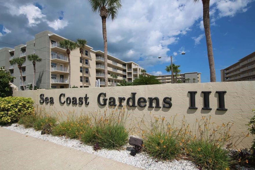 The living is easy in this immaculate 2 bedroom 2 bathroom condo at the highly desirable Sea Coast Gardens 3. Sit on your balcony and rejoice in the view of the breath-taking non-driving beaches of New Smyrna Beach while overlooking the action in the two gorgeous community pools. Building renovation to include roof, concrete and paint are underway so this condo will be in tip-top shape. Expected completion January 2022. Enjoy creating your meals in the handsomely appointed kitchen, while taking in owning your own piece of paradise. Other special highlights include tile floors throughout, renovated bathrooms, a private interior owners closet, additional storage space outside, and so much more! The community clubhouse offers two grills, a newly renovated kitchen, tables and chairs, and a TV all for your personal use! Other amenities include two large pools, two kiddie pools, four shuffle boards courts, and a beach deck with ample seating! With a prime location on the no-drive beach in New Smyrna, a handful of lush golf courses, one of a kind shops, and locally owned restaurants and boutiques nearby, this condominium has all that you could ever desire and more! This condo has excellent rental history with reservations already on the books for Winter 2022. This makes this unit a great investment property!  *All measurements and information is intended to be accurate, buyer is to verify* ;Water: City