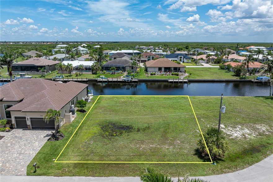 SAIL ACCESS LOT W/80FT SEAWALL IN PUNTA GORDA ISLES Prime waterfront opportunity! This build-ready, vacant lot in Punta Gorda Isles offers 80 feet of city-maintained concrete seawall and immediate sailboat access to Charlotte Harbor—no bridges, no delays. Located on a quiet, double cul-de-sac street, this full-size lot is surrounded by custom-built homes and ready for your custom, dream home. Enjoy a southeastern rear exposure with colorful sunrises and abundant natural light across your future lanai or outdoor living area. With the opening of Buckley’s Pass in 2020, you can now reach open water in under 15 minutes. City water and sewer are available.  Enjoy a wonderful, wide canal view while watching boats pass by throughout the day. Now's your chance to own a premium sail-access lot in PGI — ideal for avid boaters and those ready to build in a well-established waterfront community. Don't miss your opportunity to claim your place in paradise.