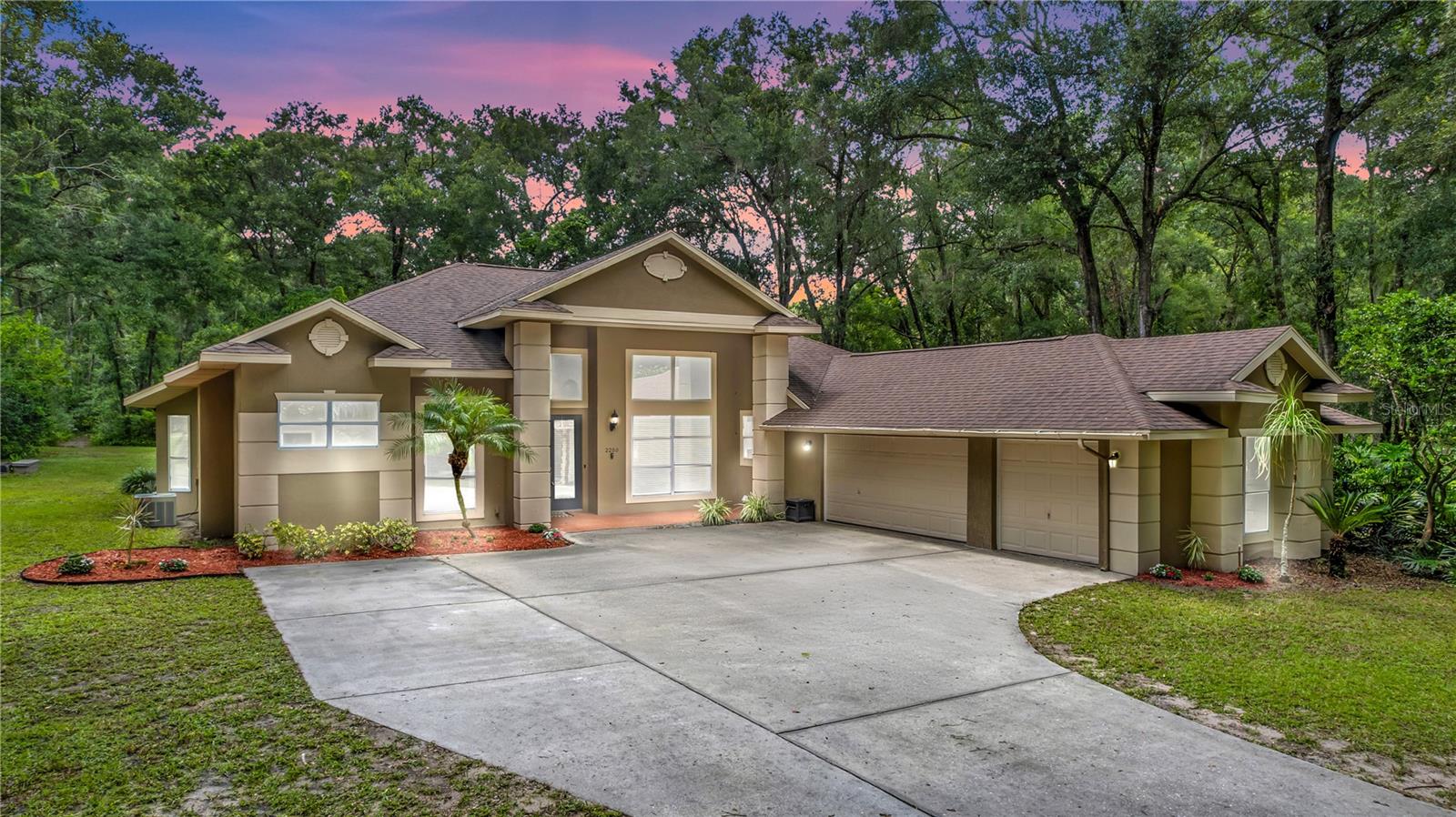 Welcome to this SPACIOUS 4-bedroom, 3-bathroom home situated HIGH AND DRY on a GENEROUS 1.13-acre lot with NO HOA. As you step through the large glass front door, you’re greeted by soaring ceilings, elegant trey ceilings in the entryway and dining room, and tile floors throughout the main living areas. The kitchen features granite countertops, a double oven, floating shelves, and ample cabinetry—perfect for everyday living and entertaining. The living area offers a warm, inviting atmosphere with a propane fireplace, shiplap accent walls, custom built-ins, and built-in surround sound. A carpeted flex room provides space for a playroom, office, or media room. The carpeted bedrooms offer comfort, while the primary suite is a true retreat with trey ceilings, double door entry, updated ceiling fans, separate vanities, a soaking tub, a walk-in shower, and a spacious walk-in closet. Additional features include a well-appointed laundry room with a utility sink, a screened-in patio with ceiling fan, a 3-car garage, gutters, an irrigation system, fire pit, and a storage shed. The home has a 2019 roof and 2019 water heater, runs on well and septic, and has the option for connection to public water. Sellers offering a one year home warranty! Located in a peaceful setting with plenty of room to spread out, this home offers the perfect blend of comfort, functionality, and freedom. Schedule your private tour today. Home may be under audio or visual surveillance.