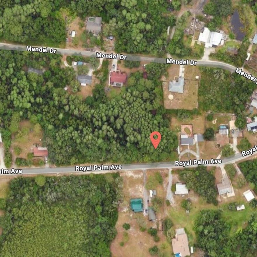Rare Opportunity. Nearly 1 Acre in the Heart of New Port Richey! Discover the perfect canvas to build your dream home on this remarkable nearly one acre lot sitting right in the heart of New Port Richey. With generous space to design not only the home you've always envisioned, but also the expansive yard to match, this property offers a lifestyle that's truly hard to find. What makes this lot truly special is the feeling it gives you. A serene, wide open escape that makes you feel miles away from the hustle and bustle, yet you're just minutes from an abundance of shopping, dining, and entertainment. The best of both worlds, peaceful tranquility and urban convenience, all at your doorstep. Whether you're ready to break ground on your forever home or looking for a smart buy and hold investment, this property delivers. As the surrounding area continues to develop and grow, so will the value of this land, making now the perfect time to secure your piece of New Port Richey's future. Opportunities like this don't last. Come see it, envision it, and make it yours.