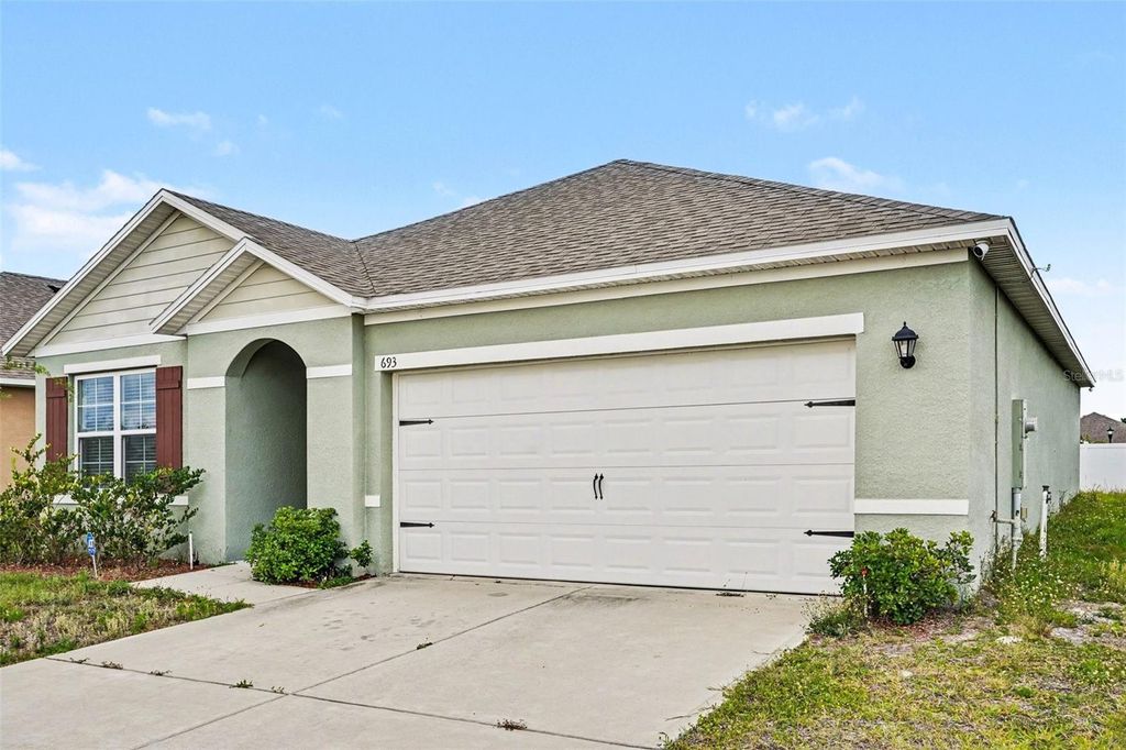 Photo of 693 Squires Grove Drive, Winter Haven, FL 33880 (MLS # TB8502032)