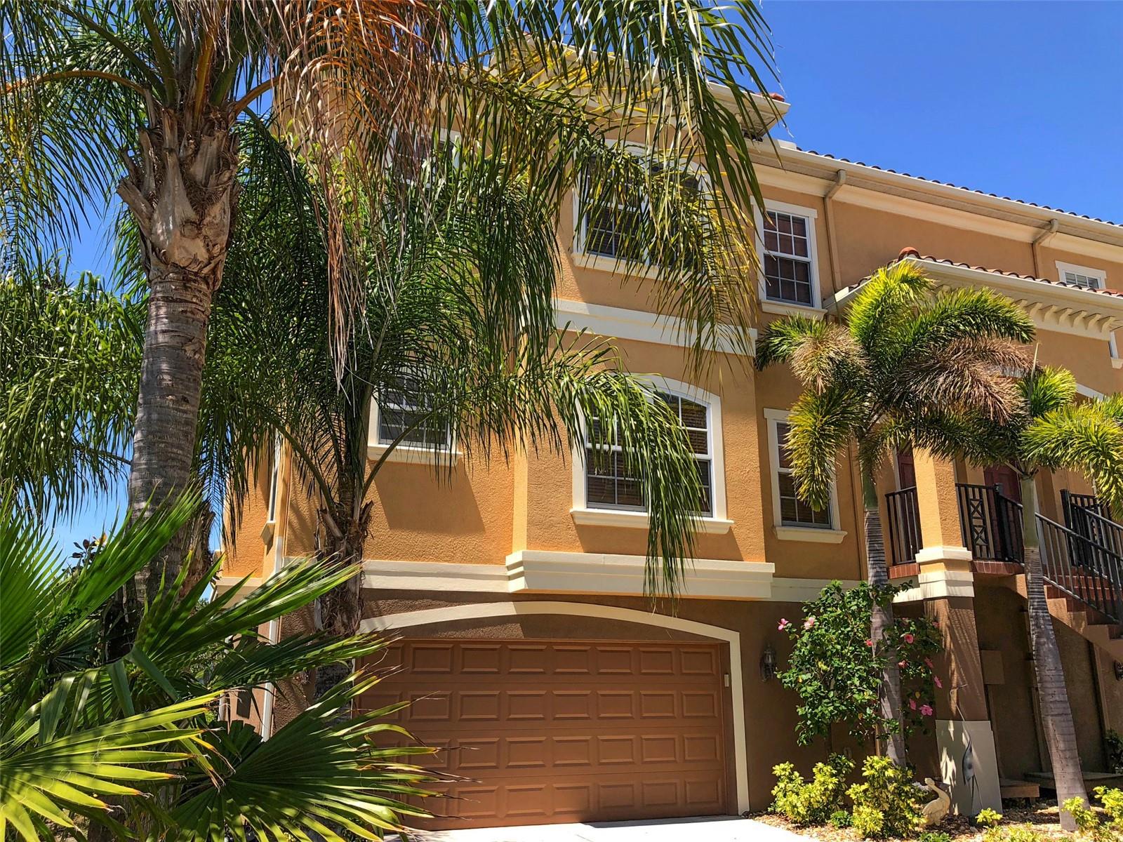 This is Florida living at it's best. Waterfront townhome in gated community. Water view. It comes with private boat slip, visible from the windows. Also available is community boat ramp. Private beach available to residents only. Community pool. In the home two fire places. One in living room and one in master bedroom. Also in master bedroom is a reading room. Balcony with water view and you're looking at sunset over Gulf of America. Master bathroom garden tub, shower, dual sinks. Kitchen island with gas stove and stainless steel hood. Large living room with fire place. Wrap around balcony with water view. Ceiling fans. Two car attached garage. Clubhouse has a community swimming pool and also community boat ramp. Private beach facing Gulf of America and you can enjoy sunset every night. Make appointment to see it and you'll love it.