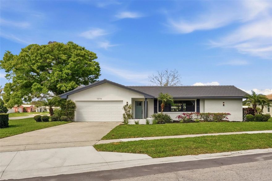 Welcome to this beautifully updated 4 bedroom, 3 bathroom home in the highly desirable Hillcrest Manors community of Largo. This move in ready sanctuary showcases a fully renovated interior highlighted by a stunning brand new kitchen and thoughtfully upgraded features throughout.  Recent improvements include a new tile roof (2026), updated bathrooms, new windows, and a refreshed screen enclosed pool with new equipment. The home also features fresh landscaping with new sod, new waterproof luxury vinyl plank flooring throughout, and fresh interior and exterior paint, creating a bright and modern aesthetic.  The chef inspired kitchen boasts stainless steel appliances, quartz countertops, and sleek modern cabinetry, seamlessly flowing into the open living and dining areas, perfect for both everyday living and entertaining.  The spacious owner’s suite offers a beautifully updated ensuite bath with double vanities, while the additional bathrooms have been tastefully renovated with contemporary finishes.  Ideally located, this home is just minutes from Seminole City Center, top-rated Seminole schools, and the pristine Gulf beaches, including Indian Rocks Beach. Enjoy close proximity to Walsingham Park, the Florida Botanical Gardens, Largo Mall, and a wide variety of dining and shopping options.