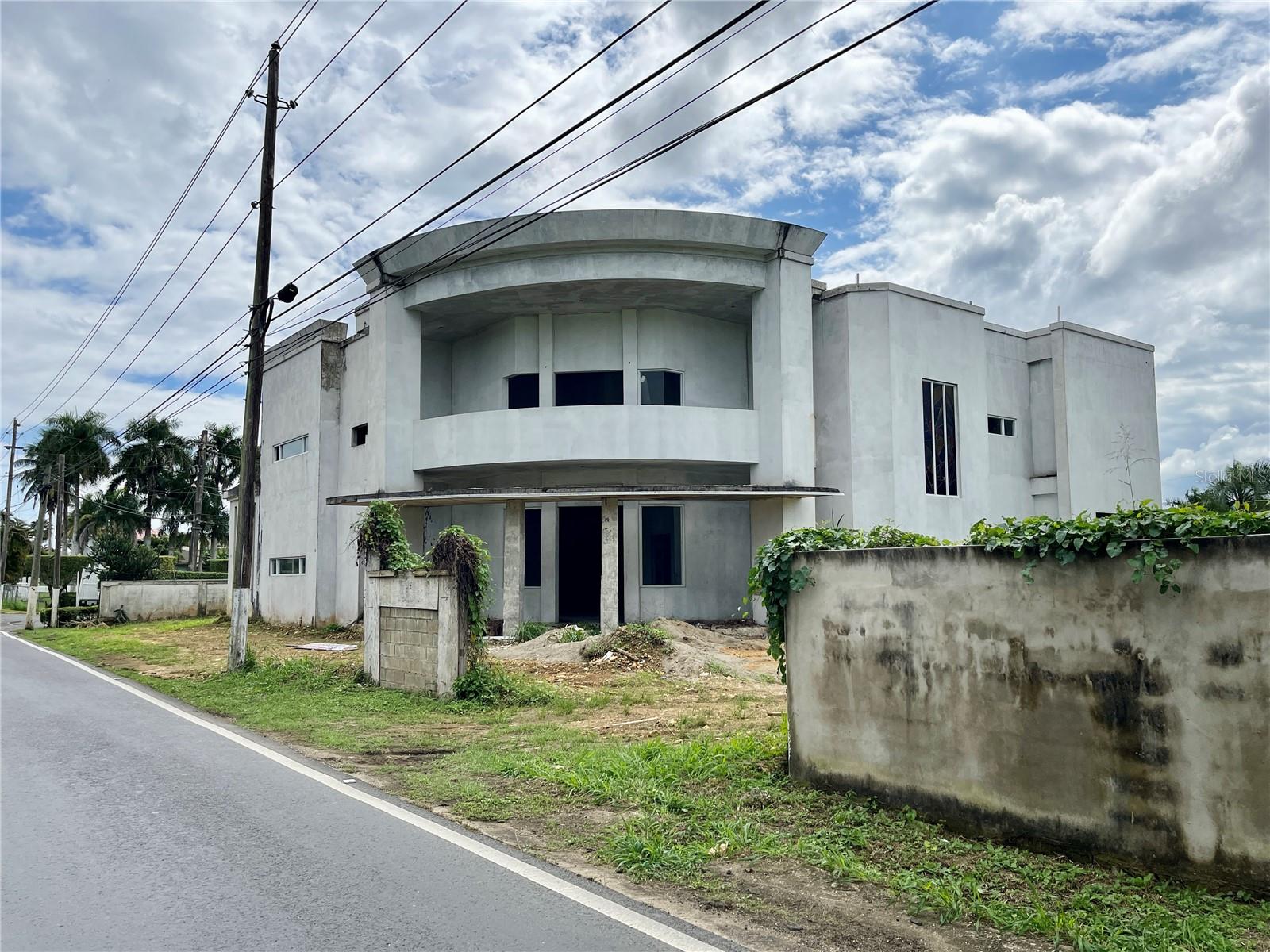 DORADO - HIGUILLAR PR RD 695 KM 5.7 Prime Opportunity Awaits: Unveiling a large residential lot adjacent to Hacienda Mi Querido Viejo in the vibrant community of Bo Higuillar, PR. Located at RD-695 KM HM 5.7, this improved land lot spans 2,571 square meters and features a 12,000 SFT two-story concrete building, presenting an ideal canvas for development. Strategic Location: Nestled in an unincorporated suburban community, the property enjoys a convenient and accessible position, ensuring visibility for potential ventures. Flat Land Parcel: 2,663 SQM; this rectangular lot provides a versatile and expansive space for development—a 12,000 SFT partial concrete building on site.
Structural Potential: The two-story vacant structure onsite adds value and potential for various uses, offering a head start for entrepreneurs with a vision. Two elevator openings: The property blueprint includes TWO elevator openings on the East and West sides of the property.
Floodway Assurance: The property is in a non-floodway zone, providing security and peace of mind for your investment. HOA: None. The property is situated in an unincorporated community, allowing for flexibility in usage.
