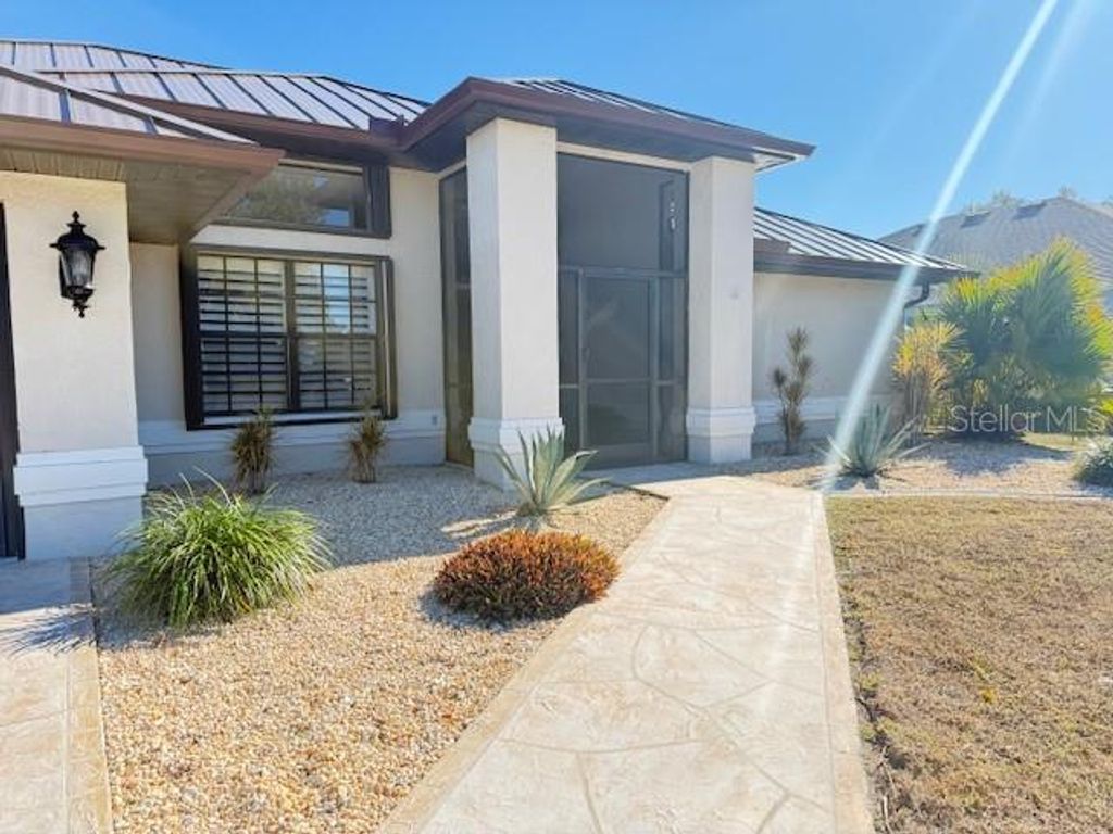 Photo of 25440 Aysen Drive, Punta Gorda, FL 33983 (MLS # A4679793)