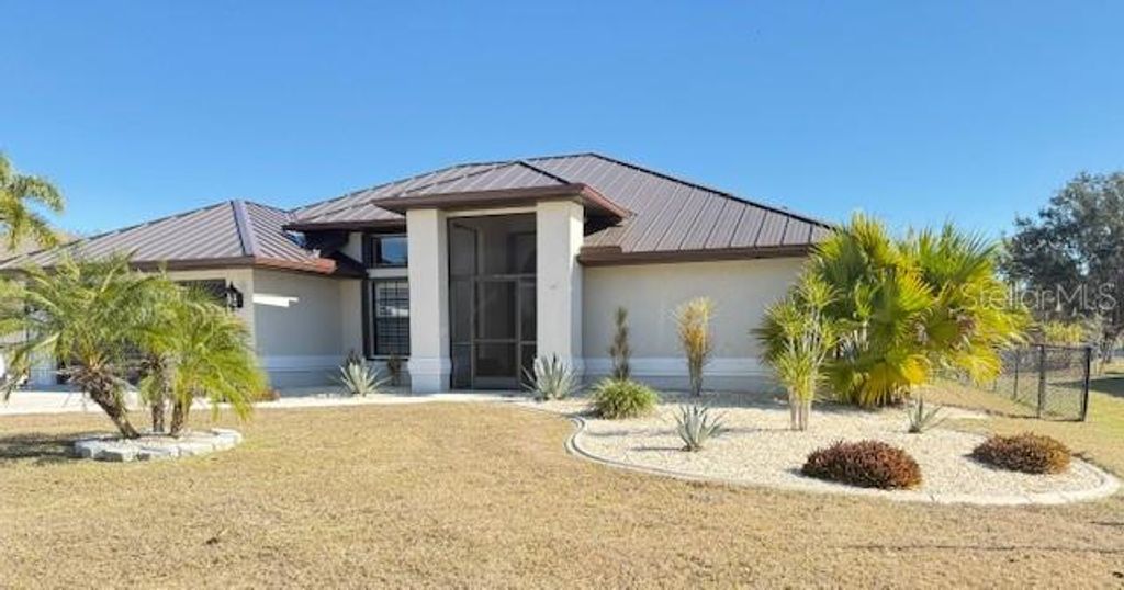 Photo of 25440 Aysen Drive, Punta Gorda, FL 33983 (MLS # A4679793)