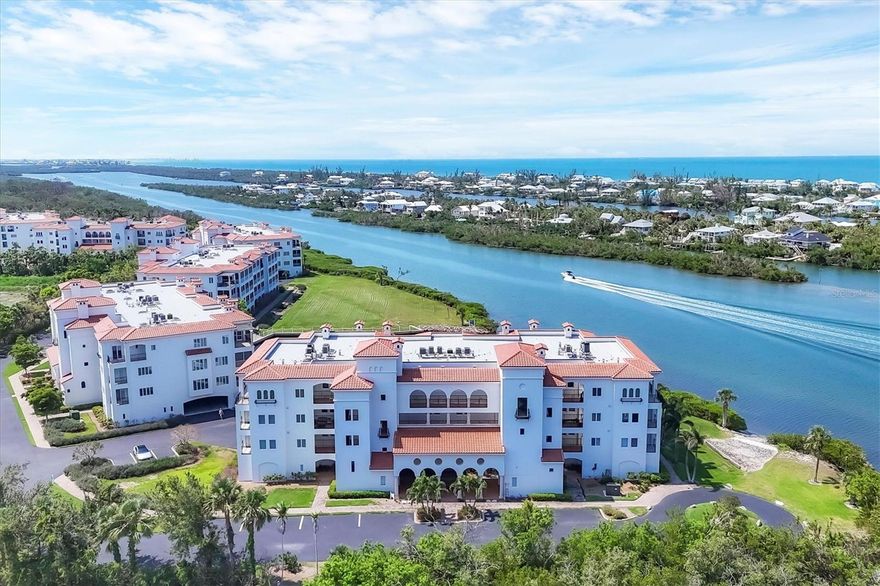 Experience unparalleled waterfront living with this exquisite 2-bedroom, 2.5-bath furnished condo perched directly on the Intracoastal Waterway in the prestigious Hacienda Del Mar community. Situated in the coveted G Building on the 3rd floor, this residence boasts prime southern exposure and serene panoramic views of the ICW and Hacienda's private boat basin. Thoughtfully designed for coastal luxury, this condo offers partial water views even from the guest bedroom, thanks to the building's forward position over the water. Watch boats drift by and enjoy the daily presence of dolphins, manatees, and tropical birdlife, all from the comfort of your private screened lanai. Built to the highest coastal construction standards, Hacienda Del Mar is known for its elite quality and timeless architecture, including; Andersen impact-resistant windows and sliders, poured beam and piling structures, terracotta tiled walkways, stained Thermatru entry doors, striking columned arrival plaza, and two elevators per building. Inside, the residence features 10-foot ceilings, 8-foot solid core interior doors, and a chef's kitchen with extensive cabinetry, counter space, and upgraded under/over-cabinet lighting. Recent enhancements include; electric hurricane shutters on the lanai, new no-see-um screening, new AC (2022) and water heater (2024), premium carpeting (2022), upgraded lanai tile flooring. Included with all the elegant furnishings as seen, this opportunity makes life comfortable and easy.  Residents enjoy access to Hacienda's resort-style amenities, including two expansive swimming pools and a spa, tennis and pickleball courts, state-of-the-art fitness center, waterfront clubhouse with gathering spaces, day dockage and secondary clubhouse. Located just minutes from gourmet dining, essential shopping, three full-service marinas, historic Boca Grande, world-class fishing, and pristine sandy beaches, this property offers a rare opportunity to embrace the ultimate Florida waterfront lifestyle.