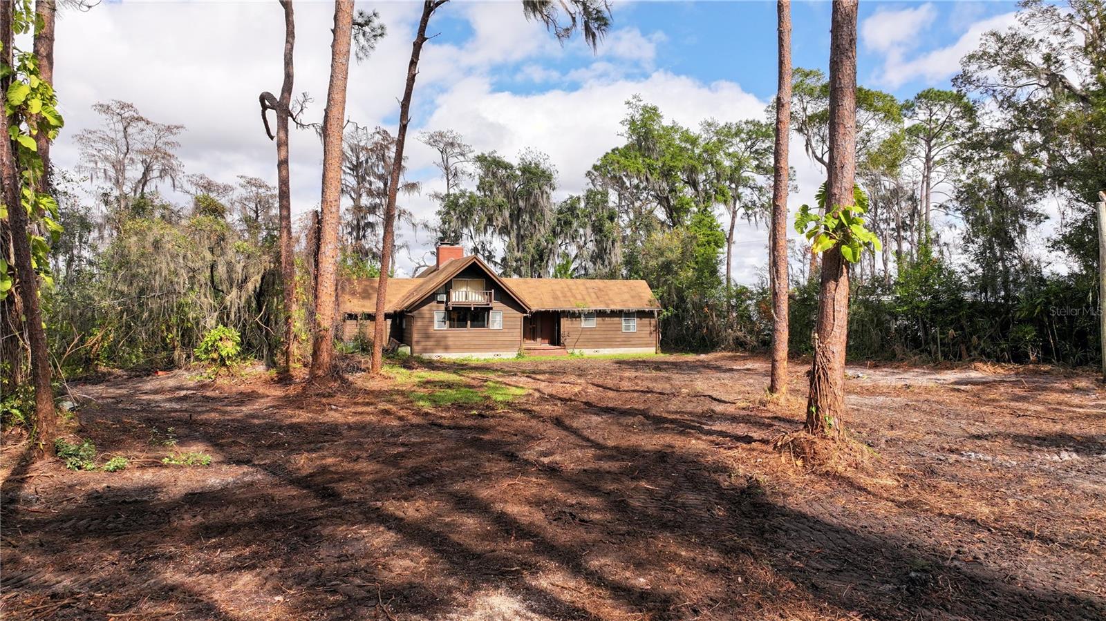 Don't miss this amazing lakefront lot with 100 feet of frontage on LAKE TIBET, part of the sought-after Butler Chain of Lakes. With direct access to 12 connected lakes, this is a dream spot for boating, fishing, and water sports. Sitting right next to Butler - Tibet Preserve Park, this 3.31-acre property offers breathtaking views and tons of potential. Build your dream home with a private gate or keep it as an investment. A rare find in Orlando’s 32836 zip code, this lot is surrounded by multi-million dollar homes and has no HOA fees. Super convenient location—just 10-15 minutes from Disney Springs, Disney World and Sea World and 25 minutes from Orlando International Airport. Plus, shopping and restaurants are just around the corner. Make this your own private paradise with privacy and serenity on the Butler Chain of Lakes!