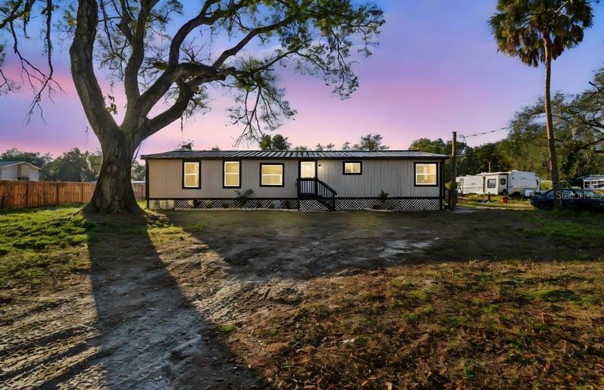 Model home now available for sale! This spacious and beautifully updated residence offers 5 bedrooms and 2 bathrooms with soaring ceilings, creating an open and inviting atmosphere throughout its 1,680 square feet of living space. Ideally located in the heart of Riverview, this centrally positioned home sits on a generous 0.35-acre lot, offering ample outdoor space and privacy.

Recent renovations include luxury vinyl flooring throughout, new ceiling fixtures, and a fully upgraded kitchen featuring new cabinetry, Level 4 granite countertops, and all-new stainless steel appliances—perfect for any home chef. The kitchen offers abundant counter space, making it ideal for hosting and entertaining. Both bathrooms have been tastefully renovated with matching cabinets and granite countertops, providing a cohesive and modern design.

An abundance of windows fills the home with natural light. Washer and dryer hookups are conveniently located inside the home for added comfort. French doors lead to a large backyard with plenty of space for family gatherings, barbecues, and holiday entertaining.

Enjoy no HOA or CDD fees and easy access to shopping, dining, and everyday conveniences, including Starbucks, Target, Publix, Riverview High School, the YMCA, gyms, and more.

Don’t miss the opportunity to tour this beautiful home—schedule your showing today!