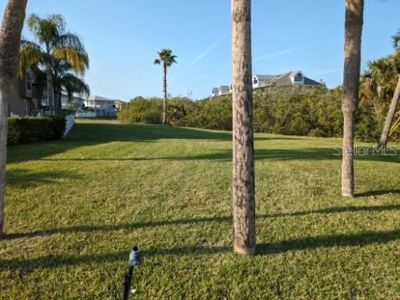 Imagine building your dream home in the stunning waterfront community of Sea Colony at Gulf Landings! This desirable neighborhood boasts two private boat ramps and a host of amenities provided by the Gulf Landings homeowners association, including a clubhouse, tennis courts, community pool, hot tub, pickleball courts, and more, all for an affordable $80 monthly HOA fee. For an additional $180 annually, residents can join the exclusive Gulf Harbors Beach Club, featuring a quarter-mile of sandy beach, 21 pavilions, charcoal grills, showers, and newly renovated bathrooms right on the Gulf of Mexico. Embrace the Florida lifestyle in this sought-after waterfront community, conveniently located near numerous beaches, a Publix supermarket, post office, bank, dry cleaners, hair salon, restaurants, coffee shops, and various shopping options.