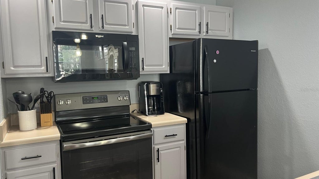 Photo of 4011 Venetian Bay Drive #104, Kissimmee, FL 34741 (MLS # S5151787)