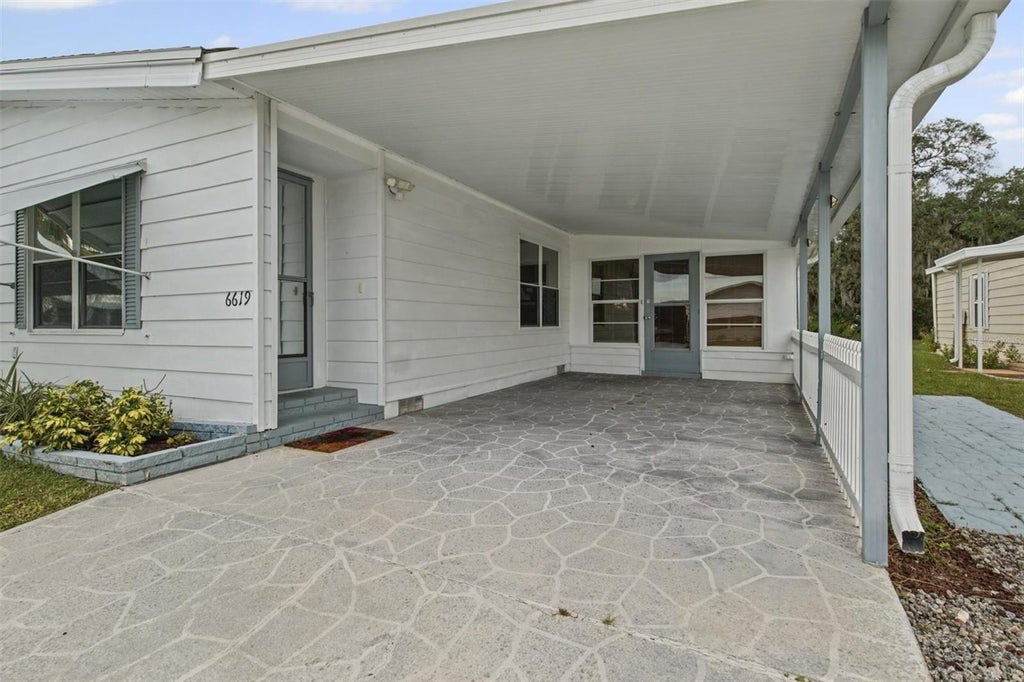 Photo of 6619 Westchester Drive NE, Winter Haven, FL 33881 (MLS # S5158998)