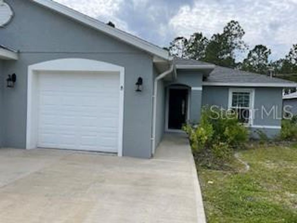 Photo of 41 Freneau Lane #B, Palm Coast, FL 32137 (MLS # FC317062)