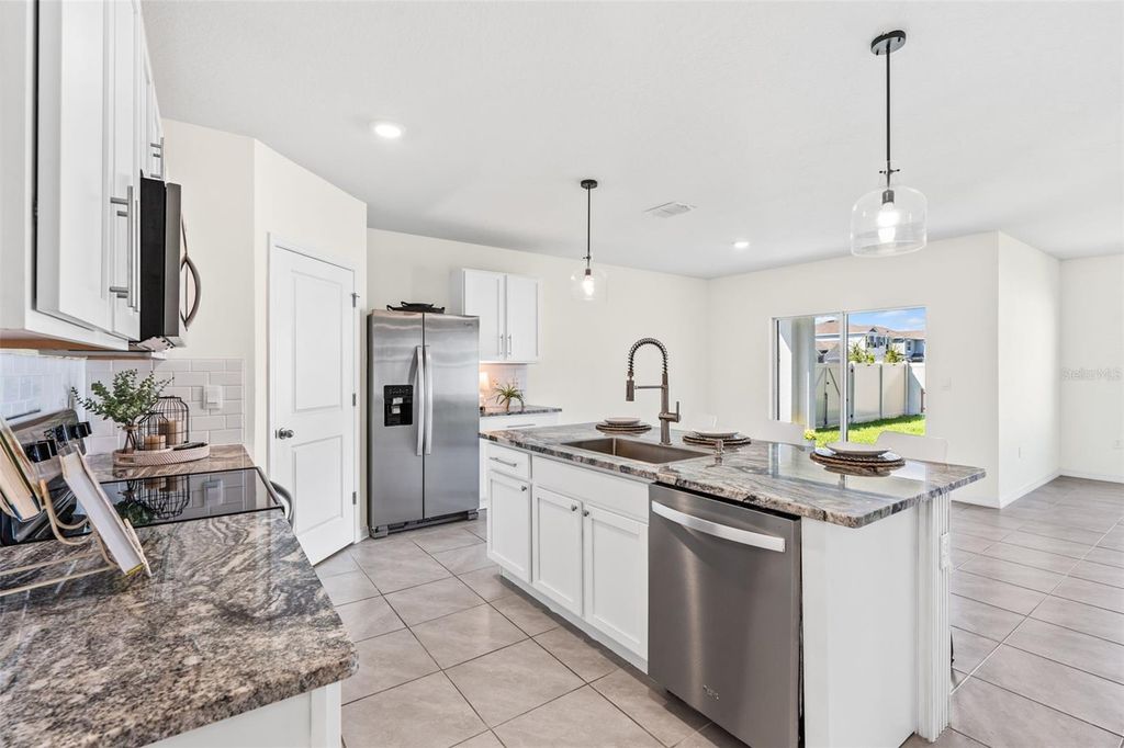 Photo of 33471 Hamilton Hill Ln, Wesley Chapel, FL 33545 (MLS # TB8420108)