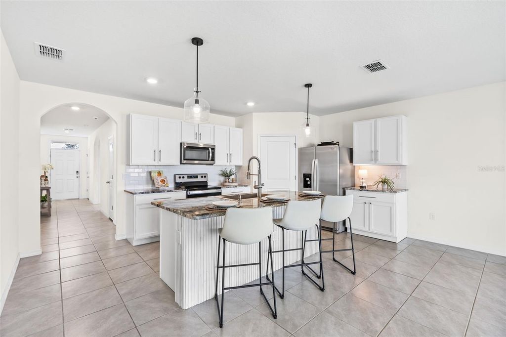 Photo of 33471 Hamilton Hill Ln, Wesley Chapel, FL 33545 (MLS # TB8420108)