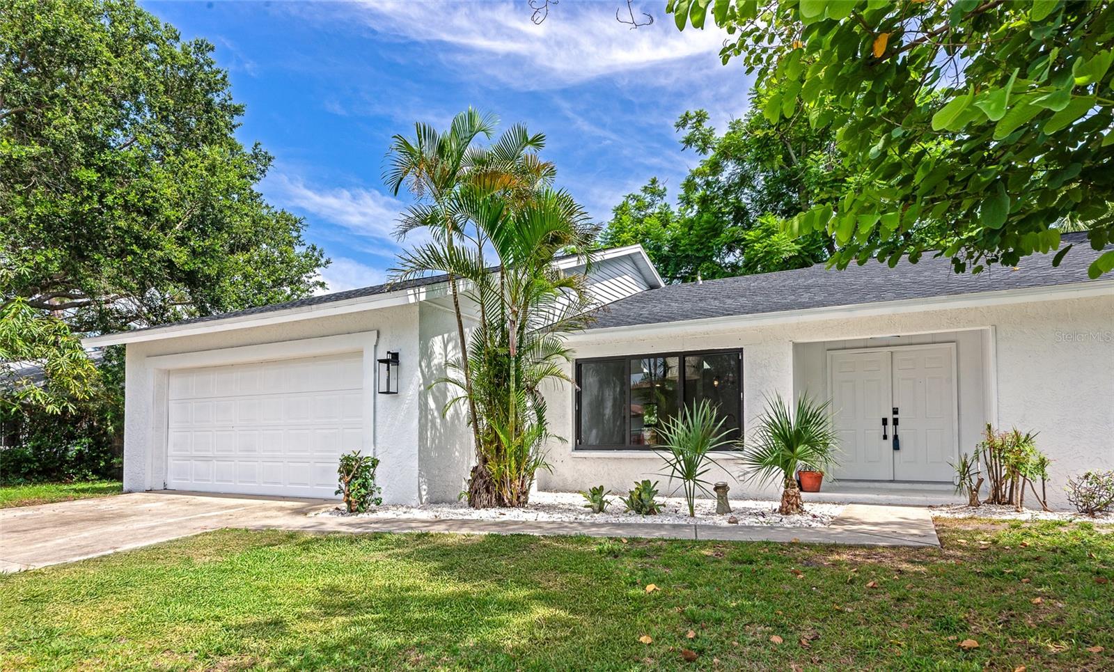 THIS HOME IS PART OF THE HOUSE BEFORE THE HOME PROGRAM. PLEASE CONTACT AGENT FOR MORE INFOR ON WHERE TO APPLY. Welcome to your new home, a true gem and Sarasota’s best-kept secret, located just a five-minute golf cart ride to the world-renowned Siesta Key Beach. This beautifully reimagined home has been completely transformed with high-end upgrades, making it feel like new construction from top to bottom, from door knobs to lights to windows. Step inside to discover a stunning interior where almost everything is brand new. A brand new roof was installed just this past week, along with hurricane-rated impact windows—offering peace of mind and modern efficiency. The home features all-new flooring throughout, creating a cohesive and contemporary look. The kitchen is a showstopper, boasting gorgeous quartz countertops, brand new cabinetry, and one of the largest islands you’ve ever seen—perfect for entertaining and everyday living. Every detail has been thoughtfully updated: all-new interior and exterior doors, every door handle, and modern lighting fixtures throughout the home. This property also features four spacious bedrooms, with the fourth room offering flexibility as a playroom, home office, or guest room—and a closet installation is currently underway to complete the space. Enjoy an open, airy floor plan with abundant natural light, beautifully blending comfort and luxury, all in a quiet neighborhood with close access to shopping, dining, top-rated schools, and, of course, the powdery sands of Siesta Key. This is not just a home—it’s practically brand new and move-in ready. Don’t miss your opportunity to own in one of Sarasota’s most desirable and convenient locations. Schedule your private showing today.