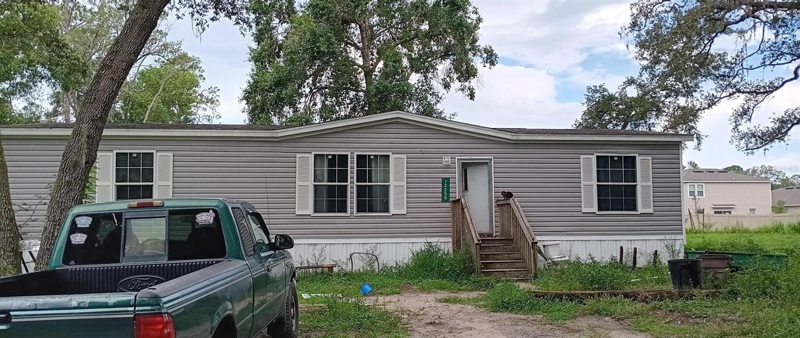 Discover the charm of this spacious mobile home nestled in Hudson. This property has a comfortable layout with multiple bedrooms and a well-appointed kitchen. Enjoy outdoor living with ample yard space, appropriate for relaxation or entertaining. Conveniently located close to local amenities, this home combines both comfort and convenience. Don't miss this opportunity to explore all that this property has to accord.