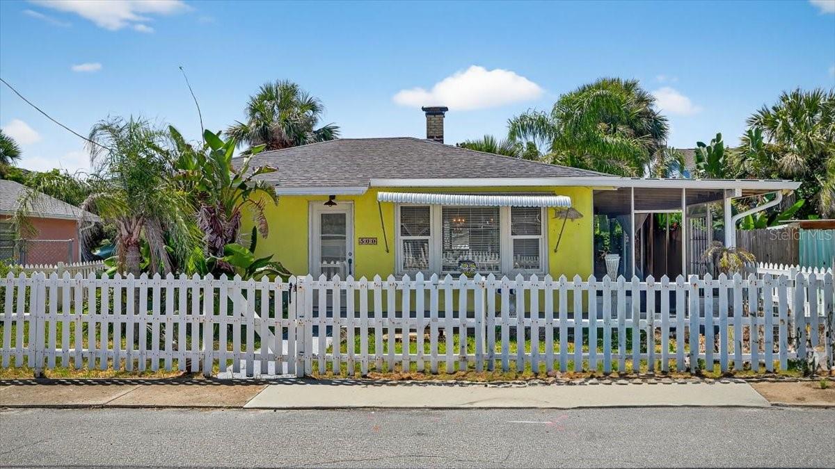 Bursting with Coastal Charm - Steps from the Beach! This colorful 2-bedroom, 1-bath beachside bungalow is full of bright coastal vibes and character. Just one block from the beach and minutes from Daytona's dining, shopping, and entertainment, it's all about location, location, location. Inside, you'll find beautiful hardwood floors, and unique architectural touches that give this home a warm, welcoming feel. Roof was replaced in 2019. Whether you're looking to create your own coastal oasis or invest in a high-demand rental property, this home is priced to sell and packed with potential.