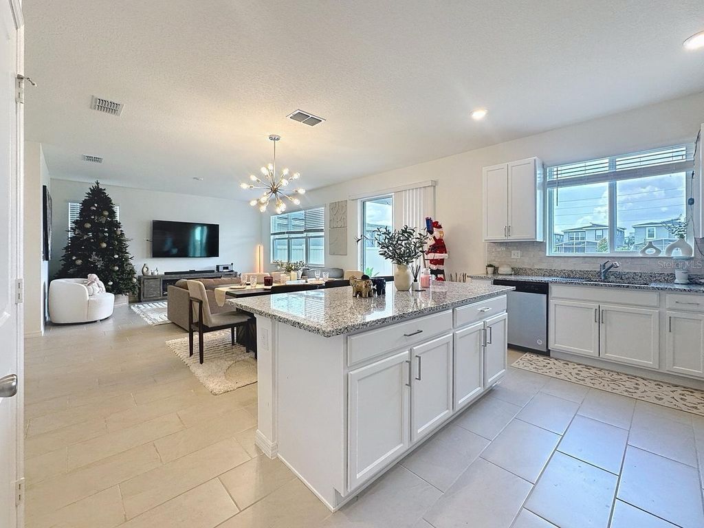 Photo of 895 Overpool Avenue, Davenport, FL 33896 (MLS # S5136413)