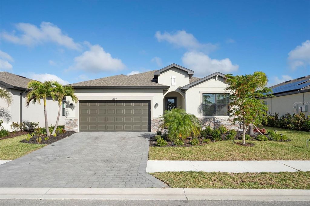 Photo of 1889 Saddlewood Circle, Port Charlotte, FL 33953 (MLS # A4662093)