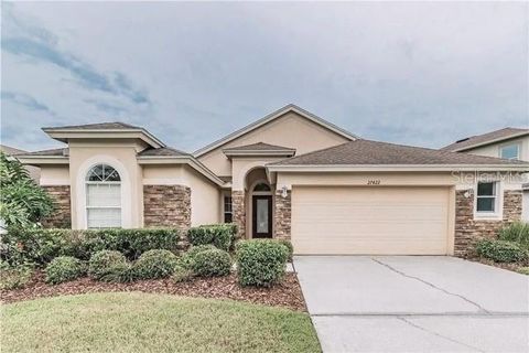 Photo of 27422 Edenfield Drive, Wesley Chapel, FL 33544 (MLS # TB8476724)
