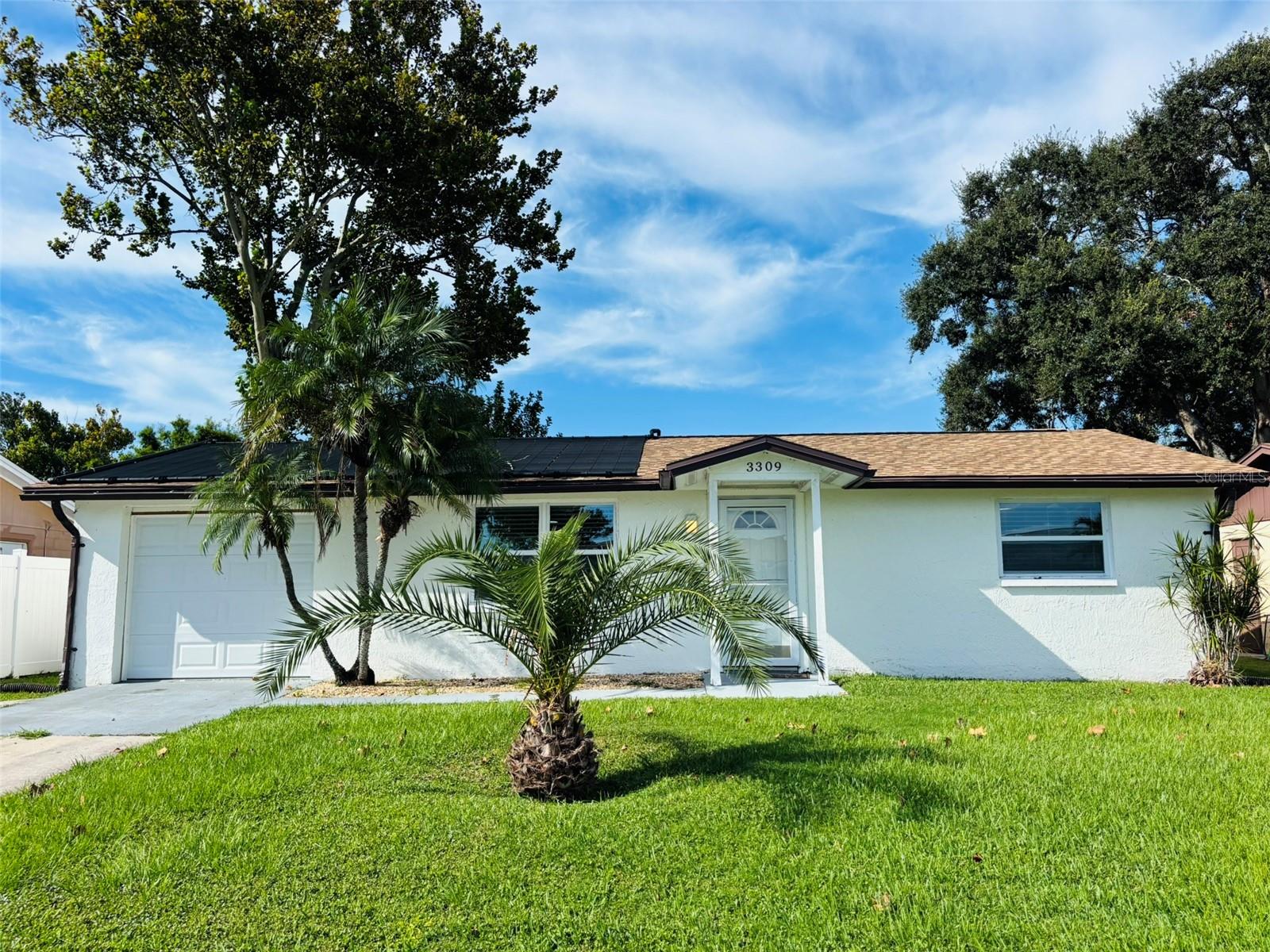 Welcome Home! This beautifully updated pool home features two bedrooms, one bathroom, and a layout designed for easy living. Step inside to a spacious living room with newly installed laminate flooring and abundant natural light.
The custom kitchen offers modern charm with stylish cabinetry, stainless steel appliances, and a convenient breakfast bar. Enjoy meals in the adjoining dining area, or take the gathering outdoors to the screened-in porch where you can relax in the fresh breeze. A versatile den/office space provides additional comfort and flexibility to suit your lifestyle.
Attention to detail shines throughout with custom moldings and thoughtful finishes. The screened-in pool area is a true highlight—complete with color-changing lights and a tranquil waterfall, it’s perfect for both relaxing and entertaining. Beyond the lanai, the fully fenced yard offers privacy, mature landscaping, and plenty of space to enjoy the outdoors.
This home combines comfort, style, and functionality—ready for you to move in and enjoy.