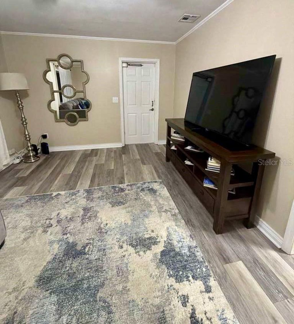 Photo of 7815 Pine Hill Drive, Tampa, FL 33617 (MLS # TB8501584)