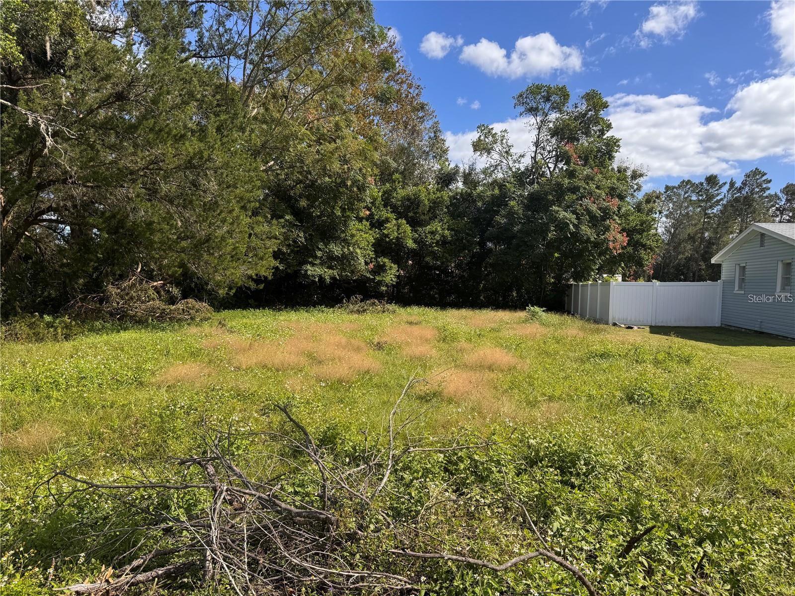Charming Vacant Lot in Rolling Acres - Brooksville. Here’s your chance to build your dream home in the well-established Rolling Acres
neighborhood. This small residential lot is perfect for those seeking a peaceful, friendly community with plenty of character. Surrounded by
mature trees and nestled within a neighborhood known for its serene, rolling landscapes, this lot offers a cozy and tranquil setting with plenty of potential. Located just minutes from downtown Brooksville, you’ll enjoy easy access to local shopping, dining, schools, and parks. The quiet, family-friendly atmosphere of Rolling Acres provides a perfect retreat, while still keeping you connected to everything you need. This is the perfect opportunity to build a home that fits your lifestyle in one of Brooksville’s most beloved neighborhoods. Don’t miss out—this lot offers big potential at an affordable price. Start planning your future today!
