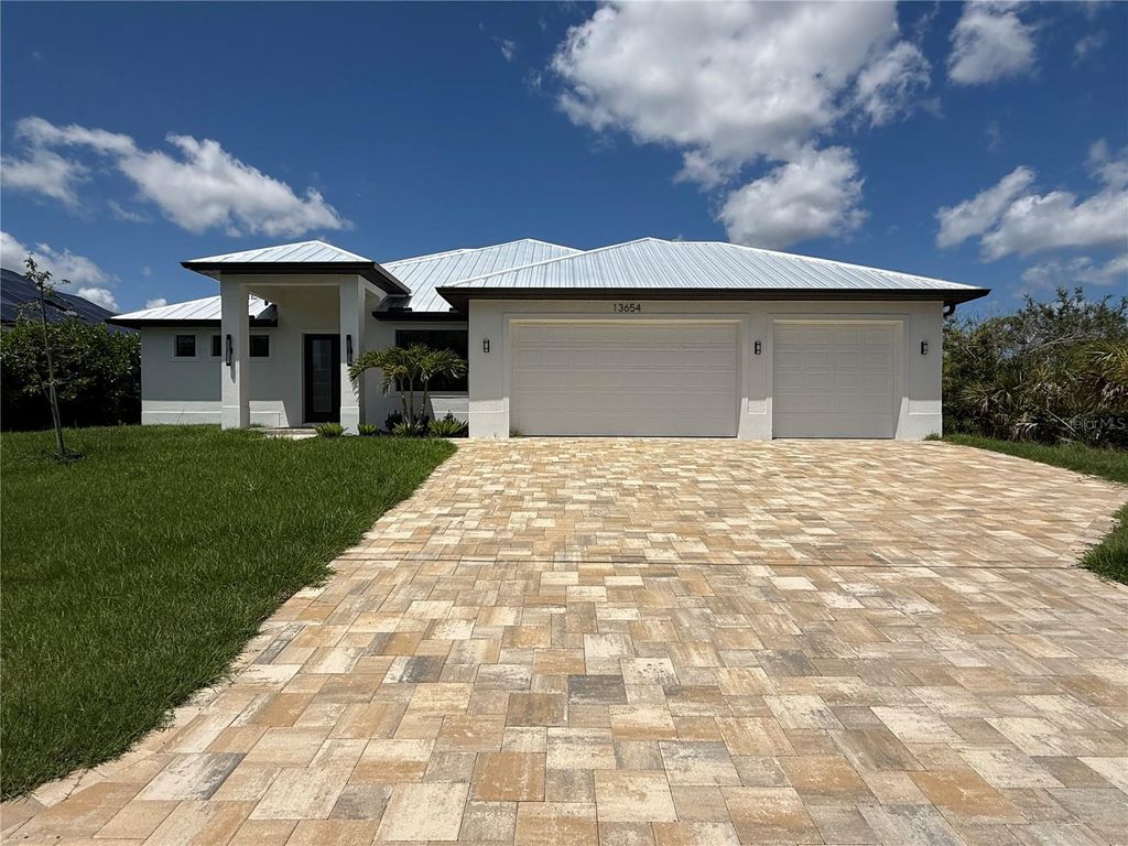 Photo of 13654 Allamanda Circle, Port Charlotte, FL 33981 (MLS # C7477806)
