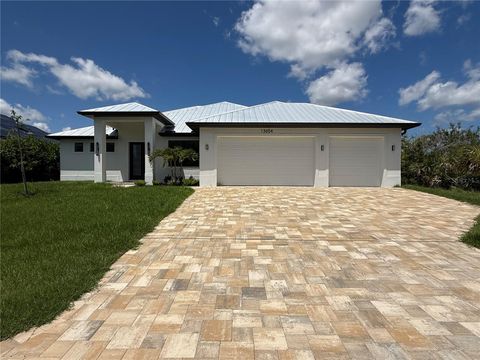 Photo of 13654 Allamanda Circle, Port Charlotte, FL 33981 (MLS # C7477806) Photo of 13654 Allamanda Circle, Port Charlotte, FL 33981 (MLS # C7477806)