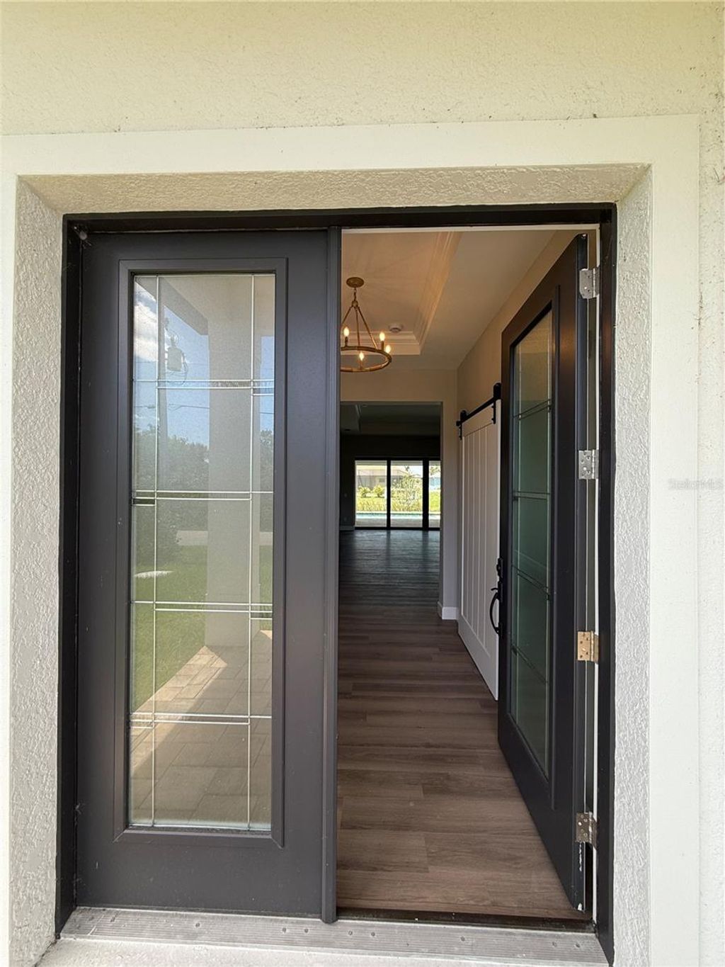 Photo of 13654 Allamanda Circle, Port Charlotte, FL 33981 (MLS # C7477806)