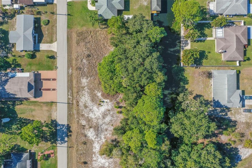 Build your Florida dream home on this prime 0.23-acre residential homesite located in the Sun ’N Lakes community of Lake Placid, Florida. This level, buildable lot offers a solid canvas for a custom residence or a smart investment in a community known for peaceful, rural-lake living. As part of the Sun ’N Lakes Special Recreation District, property ownership provides access to a private community park on the shores of Lake Grassy—a scenic, spring-fed lake spanning over 500+ acres that’s popular for boating, fishing, and lakeside relaxation. Amenities at the park include a boat ramp, sandy beach, picnic areas, playground, and courts for tennis/pickleball and shuffleboard, all maintained through a modest annual assessment included in property taxes. Enjoy the quintessential Central Florida lifestyle with water-based recreation right at your doorstep. Lake Grassy boasts sandy bottoms ideal for fishing and boating, and the community park fosters outdoor fun for all ages. This lot is offering easy access to local dining, shopping, and services while remaining nestled in a quiet, lakeside neighborhood setting. Downtown Lake Placid—known as the “Town of Murals” with vibrant public art and small-town charm—is only a short drive away. No restrictive gated fees—just pure potential. Don’t miss your chance to secure your piece of the Sunshine State!