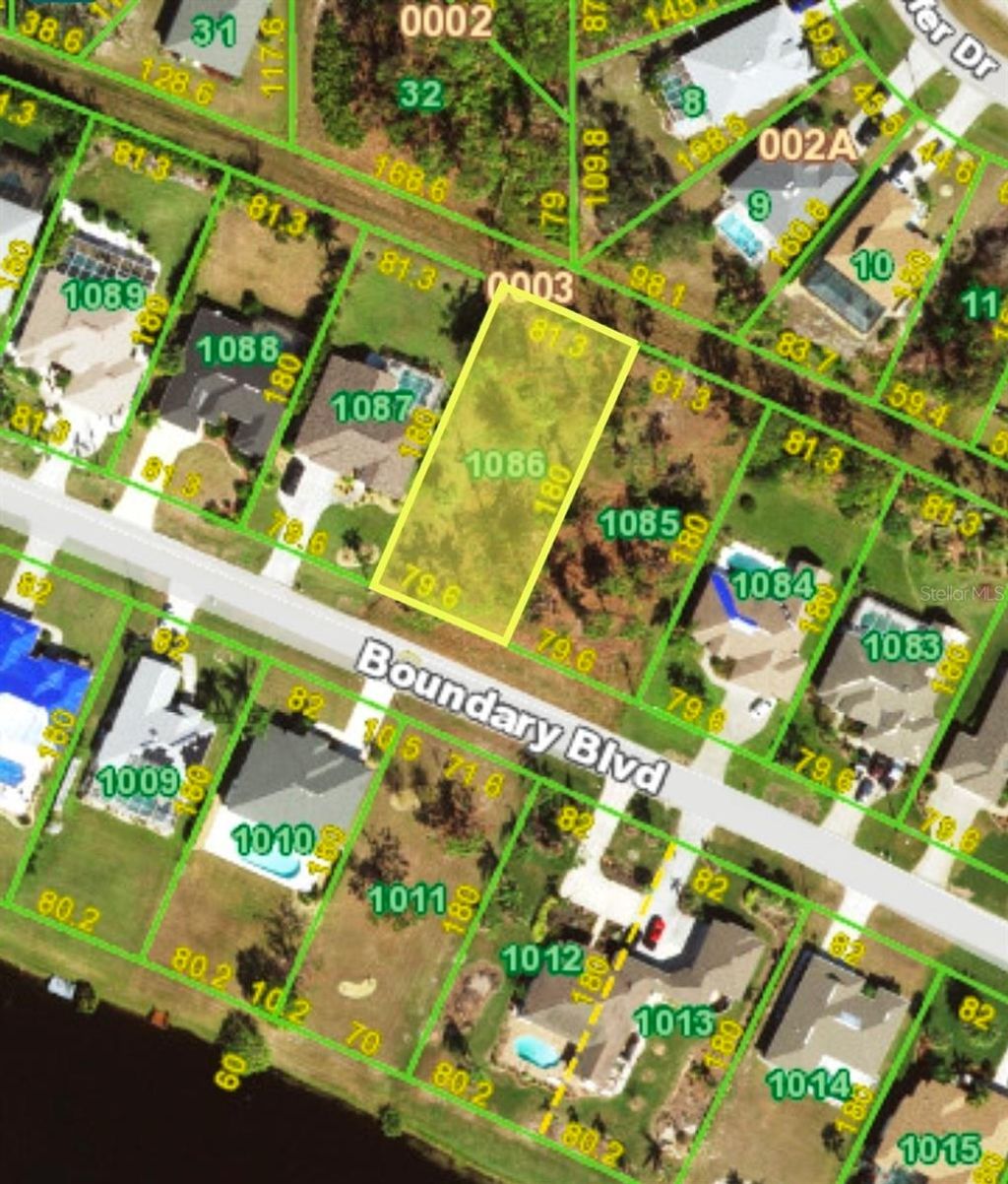 Photo of 643 Boundary Boulevard, Rotonda West, FL 33947 (MLS # D6147054)