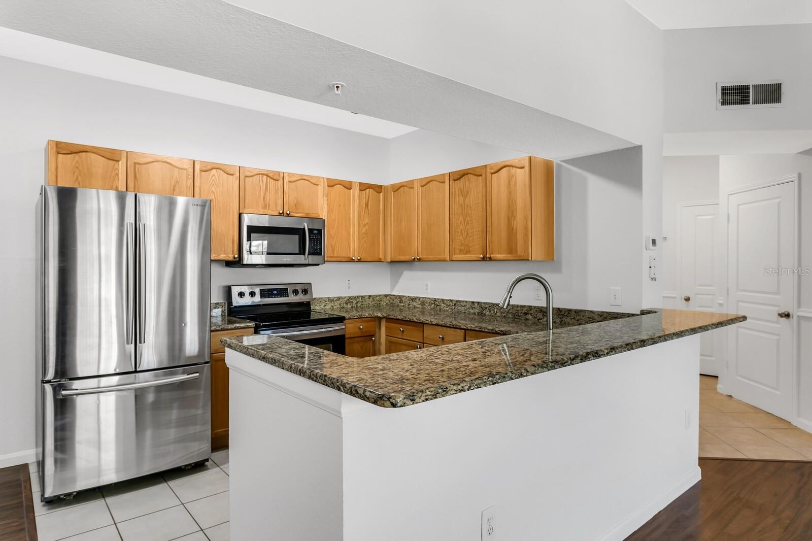 OXFORD PLACE AT TAMPA PALMS A - Residential