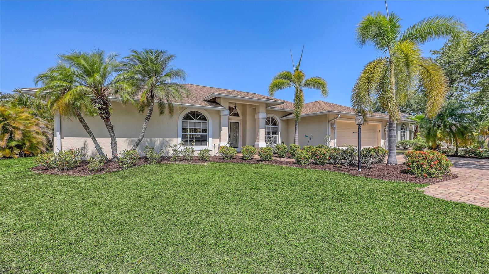 Welcome to your own personal haven at 5698 Country Walk Lane, an immaculate 4-bedroom lakefront residence in Sarasota's reputable school district, boasting unmatched charm and contemporary elegance. This meticulously maintained home boasts opulent finishes, featuring luxurious porcelain tile flooring, refreshed interior and exterior paint, a newer roof, water heater, and a modern HVAC system enhanced with UV purification—perfectly designed for both comfort and convenience.
Step into the inviting open floor plan where full-length sliding glass doors seamlessly blend indoor luxury with outdoor tranquility, opening onto a generously-sized screened lanai that overlooks expansive views of a serene lake. Imagine creating your custom outdoor paradise here, with ample room for an elegant pool and spa, turning your backyard into a private retreat.
The gourmet kitchen is a culinary dream, highlighted by stunning quartz countertops, sleek cabinetry, and abundant workspace, perfectly suited for hosting elegant gatherings or intimate family dinners. Retreat to your exclusive Master Suite, featuring beautiful wood-look tile flooring, a spacious walk-in closet, dual vanities, a relaxing garden tub, and a Roman-style shower.
Positioned on a coveted oversized corner lot at the end of a quiet, private street, this property ensures maximum tranquility and privacy. With its premium paver driveway and beautifully landscaped gardens, the curb appeal is undeniable. Located just moments from Downtown Sarasota, pristine Siesta Key beaches, vibrant arts scenes, upscale shopping, and gourmet dining, this home provides an unparalleled lifestyle.
Make 5698 Country Walk Lane your sanctuary—where luxury meets serenity, and your dream outdoor oasis awaits.