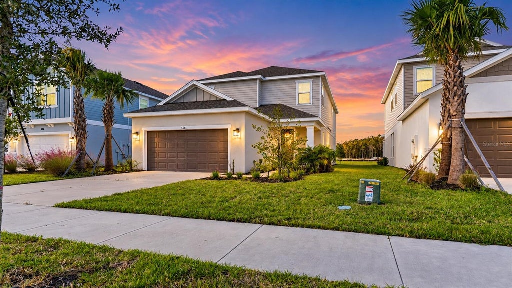 Photo of 5665 Ficus Aurea Street, Kissimmee, FL 34758 (MLS # O6452469)