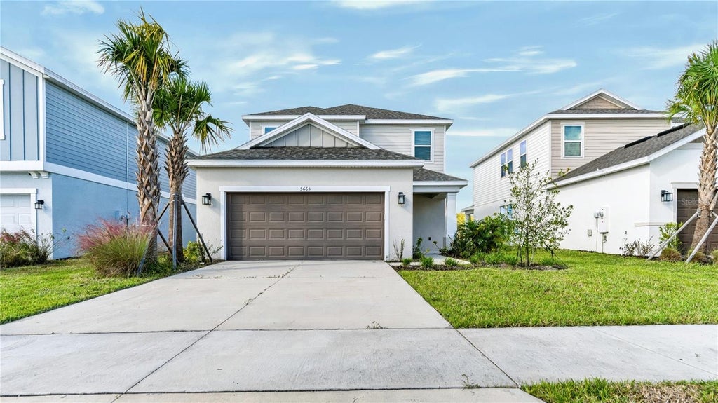Photo of 5665 Ficus Aurea Street, Kissimmee, FL 34758 (MLS # O6452469)