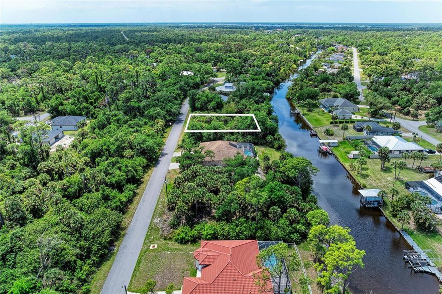 UNRIVALED BOATER’S PARADISE WITH GULF ACCESS! 
Embark on the ultimate Florida lifestyle from this spectacular homesite situated along the serene Apollo Waterway, offering a seamless gateway to the Gulf of Mexico, Charlotte Harbor, and the Myakka River. This rare gem is perfectly prepared for your custom dream home, positioned safely in a highly coveted X-Flood Zone for maximum peace of mind and significant insurance savings! No HOA! No CDD! Not in Scrub Jay per Charlotte County! The property is fully functional today with electricity available for your convenience during the building process. Architectural possibilities are endless allowing for a breathtaking, seamless transition from your future custom pool directly to the dock. This tropical canvas provides the perfect backdrop for watching world class sunsets. Perfectly tucked between Wellen Park, North Port and Port Charlotte, you are minutes away from pristine beaches, championship golf, High-end Marinas, and upscale dining. Your “Ready to Build" slice of paradise is waiting for your imagination! Call with your offer today!