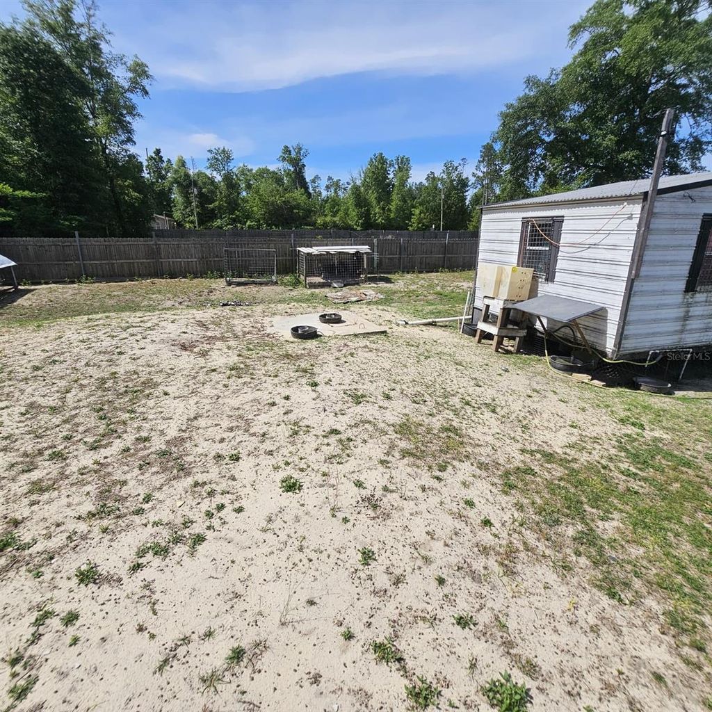 Photo of 12132 Pineridge Road, Fountain, FL 32438 (MLS # O6403857)