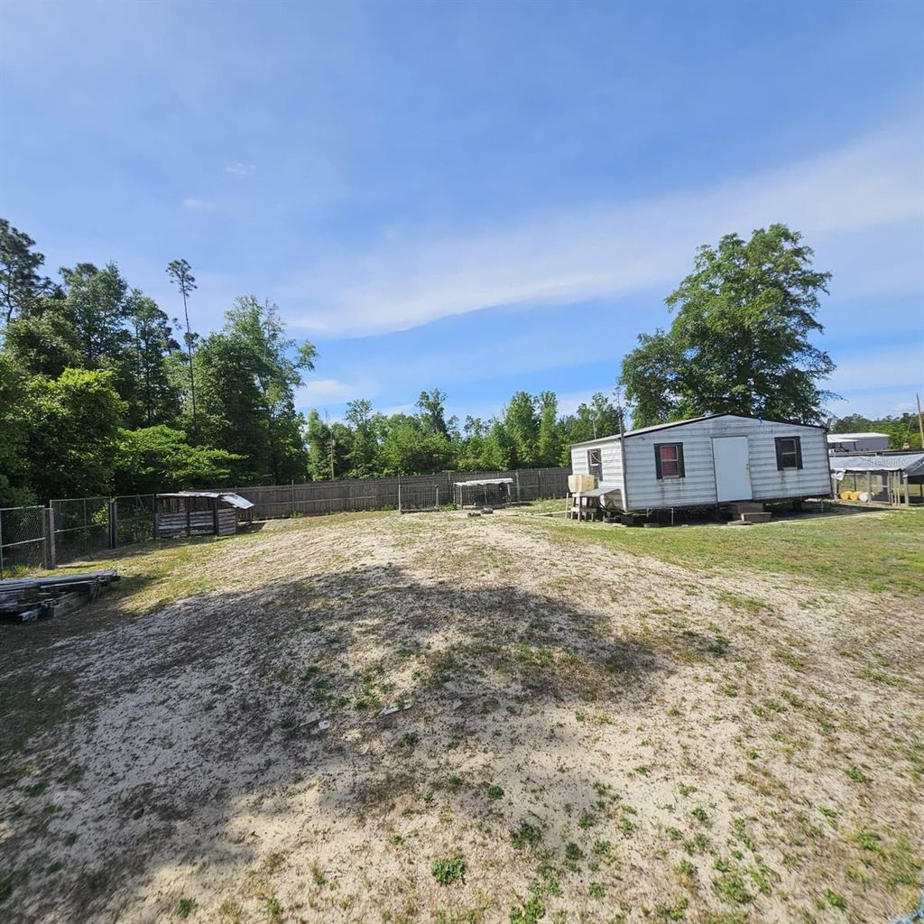 Photo of 12132 Pineridge Road, Fountain, FL 32438 (MLS # O6403857)