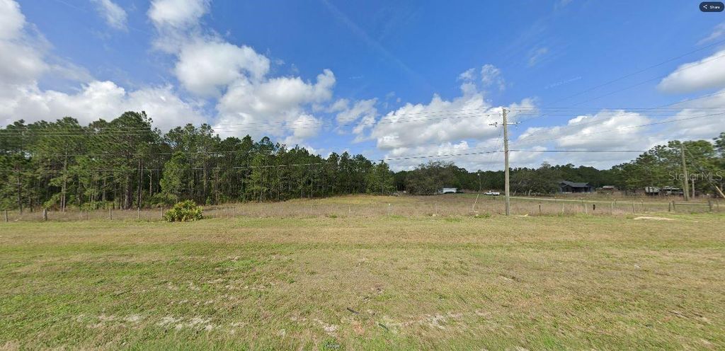 Photo of Commonwealth Ave N, Polk City, FL 33868 (MLS # O6263836)