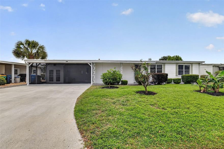 Come see this beautiful, well maintained, FULLY FURNISHED 3-BEDROOM, 2-BATH TURNKEY HOME located in the IMPERIAL TERRACE EAST 55+ COMMUNITY in TAVARES.  This 1984 home has light LAMINATE FLOORING and PANELING throughout.  The kitchen has WHITEWASH cabinets, SOLID countertops, and APPLIANCES including a FRIGIDAIRE SIDE BY SIDE REFRIGERATOR, GE STOVE, HAMILTON BEACH MICROWAVE, EHB DISHWASHER and KEURIG COFFEE POT.  The dining room has a full wall built-in cabinet and hutch.  Enjoy the large living room with 60" VIZIO TV, or gaze into the front yard to view MULTIPLE FRUIT TREES and SERENITY.  The laundry room is INSIDE the home, complete with AMANA WASHER and AMANA ELECTIRC DRYER.  The enclosed FLORIDA ROOM has TWO QUEEN BEDS and a SOFA BED to accommodate family and friends, along with a CEILING FAN and wall mounted AIR/HEAT UNIT.  Two SMOKE DETECTORS are installed in the home, as well as CENTRAL AIR/HEAT to keep the perfect temperature day and night.  The high ceiling CARPORT is a relaxing area too, complete with furniture, a BIG SCREEN TV, and a FULLY RETRACTABLE REMOTE CONTROLLED SCREEN for privacy and sunlight.  There is an inside WORKSHOP/STORAGE ROOM for your golf cart, as well as ADDITIONAL STORAGE with a REFRIGERATOR and SINK.  The driveway is big enough for TWO CARS and a GOLF CART.  An IN-GROUND PEST GUARD SYSTEM surrounds the property.  The Community is GOLF CART friendly, has an OUTSIDE POOL, SHUFFLEBOARD, BOAT MARINA, and CLUBHOUSE, with many activities planned throughout the year.  YOU OWN YOUR OWN LAND!!  Within a short driving distance are dining, shopping and medical providers.  The HARRIS CHAIN OF LAKES is easily accessed in this area.  Call to schedule your TOUR TODAY!