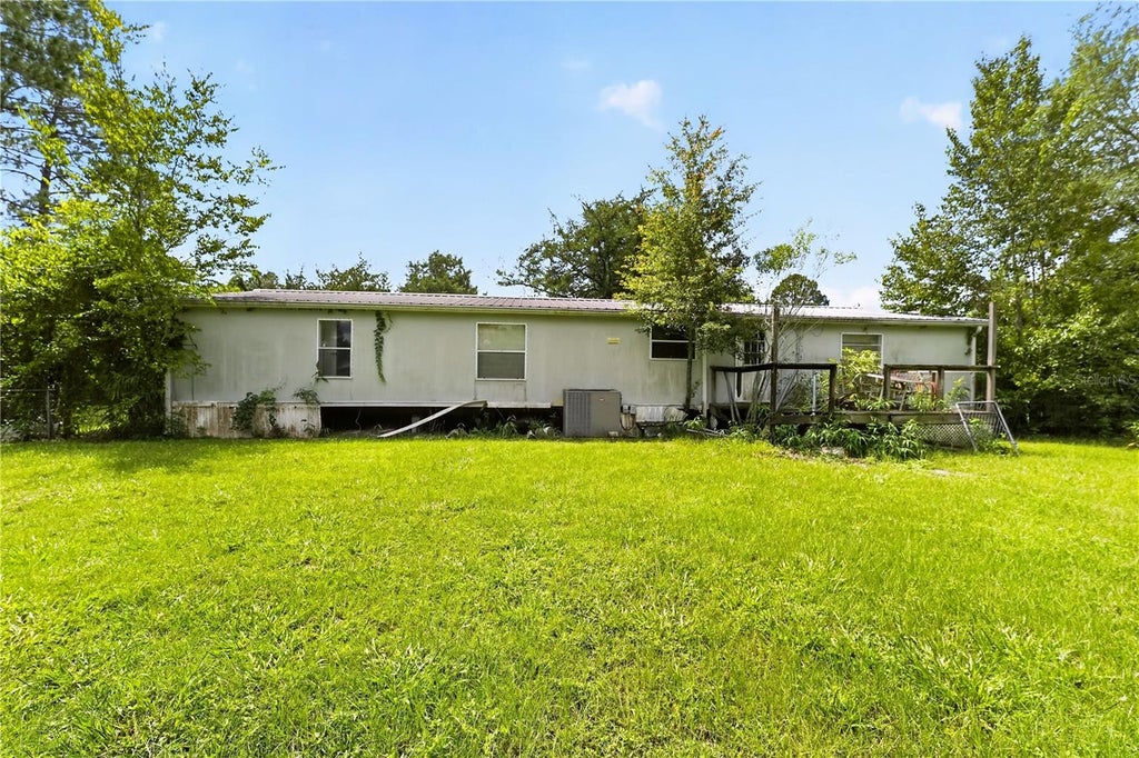 Photo of 9316 SW 99th Place, Gainesville, FL 32608 (MLS # GC543249)