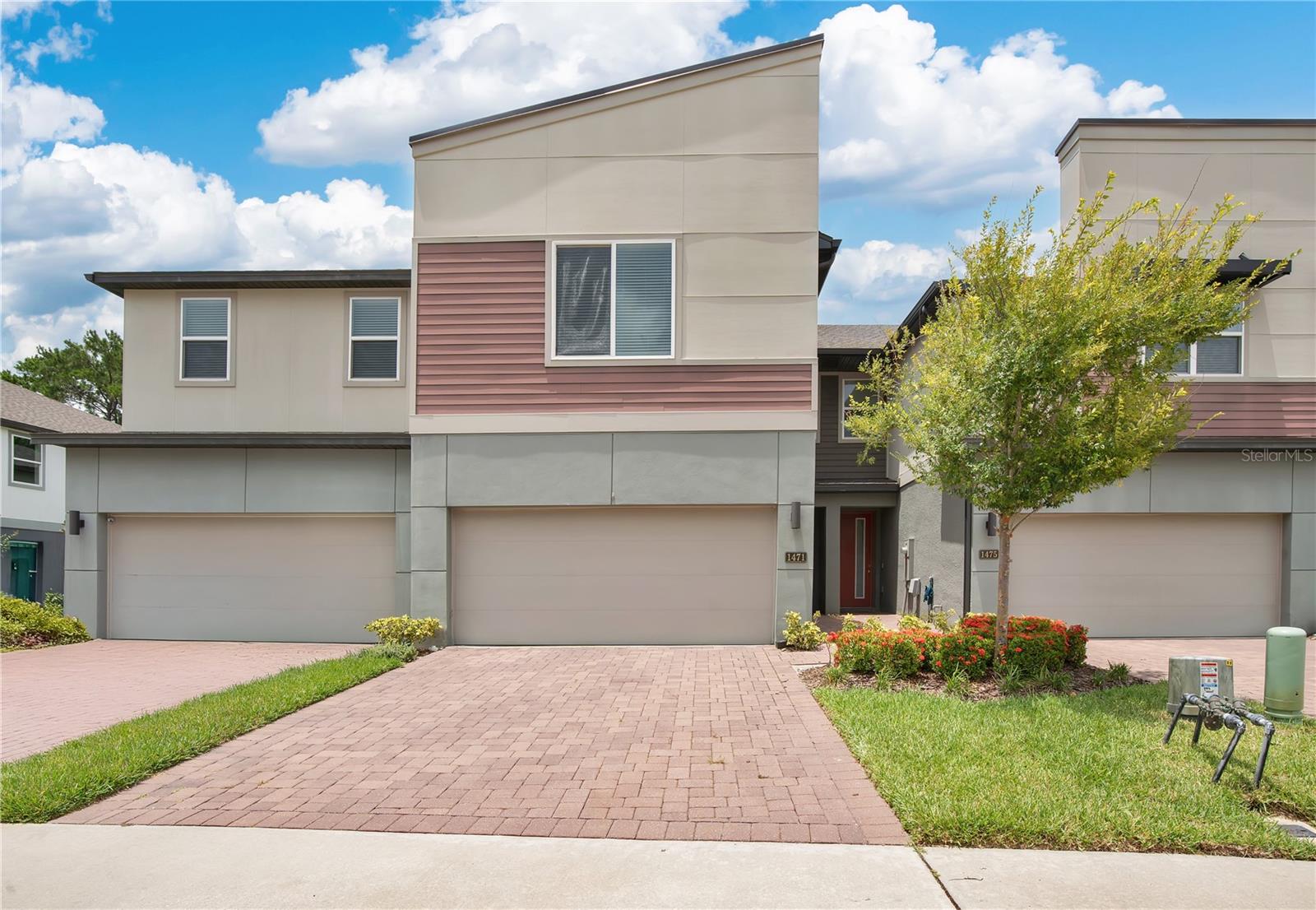 Step into comfort and style in this beautifully maintained townhome, built in 2020 and thoughtfully designed for modern living. The open-concept layout features granite countertops, sleek finishes, and an oversized, screened-in lanai that opens to a tranquil wooded backdrop—ideal for unwinding or entertaining. Upstairs, you'll find all the bedrooms, a spacious loft perfect for a home office or cozy den, and a conveniently located laundry room. The owner’s retreat impresses with a custom walk-in closet featuring built-in organization that blends function with luxury. An extra-deep two-car garage adds rare practicality, while the HOA takes care of all exterior maintenance, landscaping, internet, cable, as well as the community pool and gated entry, simplifying everyday life.
Ideally situated in a vibrant and central location, you’re just minutes from Park Avenue’s boutique shopping, restaurants, and Central Park’s lush green spaces. Local favorites like Foxtail Coffee Co. and Kelly’s Homemade Ice Cream are nearby for daily delights, and UCF is only a short drive away. With excellent schools and a close-knit community vibe, this home delivers a perfect blend of privacy, convenience, and charm—all in a move-in-ready package.
1% lender credit (based on loan amount) toward closing costs or rate buy-down with seller’s preferred lender. Ask for details!